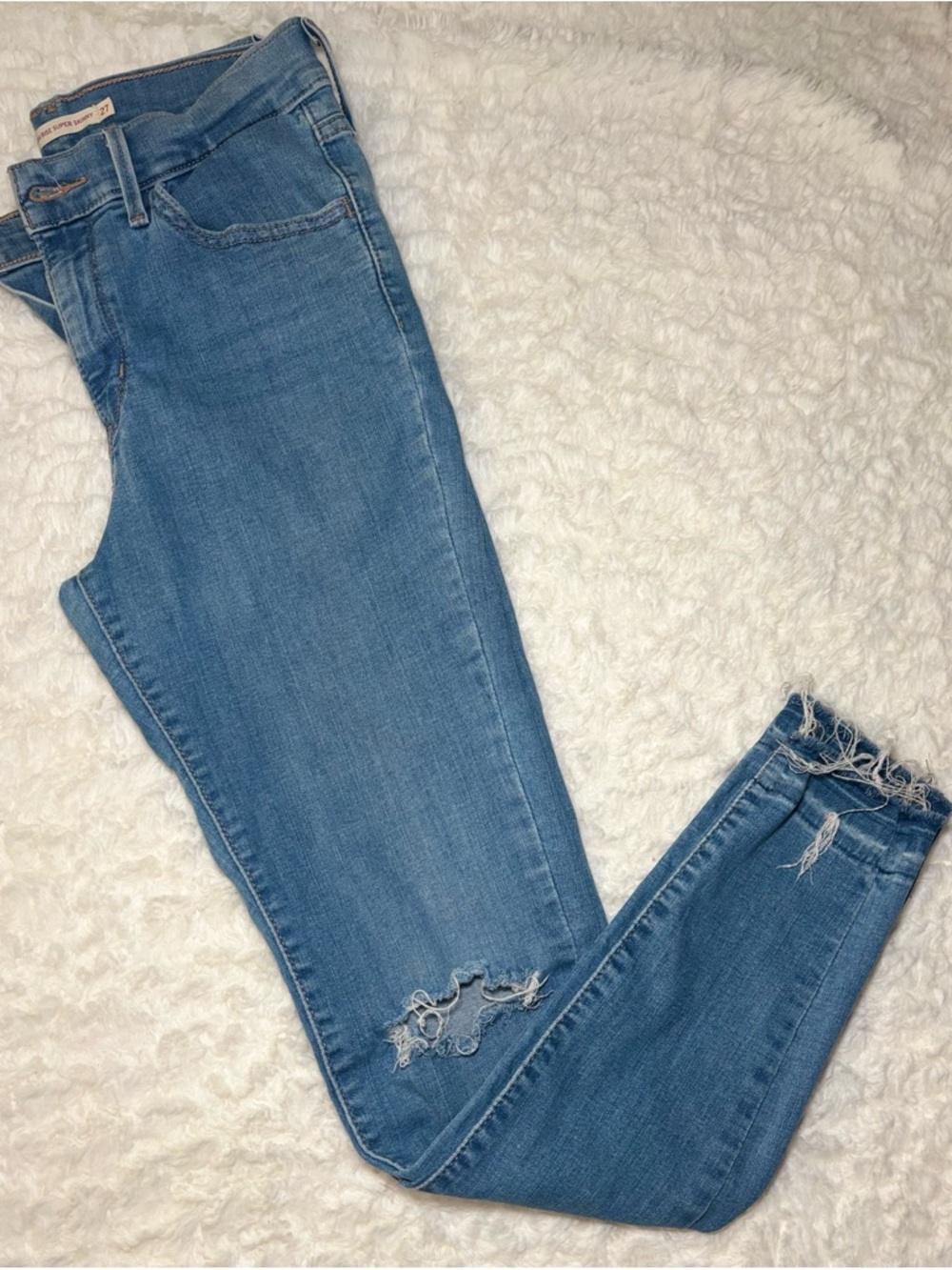 Levi's Light Blue Skinny Jeans with Distressed Hem